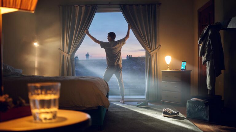 Illustration of a person executing an If–Then wake-up script at dawn: standing up, switching on a bright light, sipping water, and opening curtains